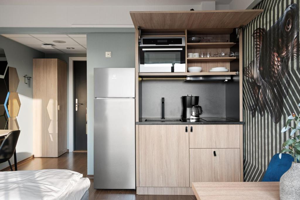 Kuchyň nebo kuchyňský kout v ubytování Bjørvika Apartments - Sirkus Renaa