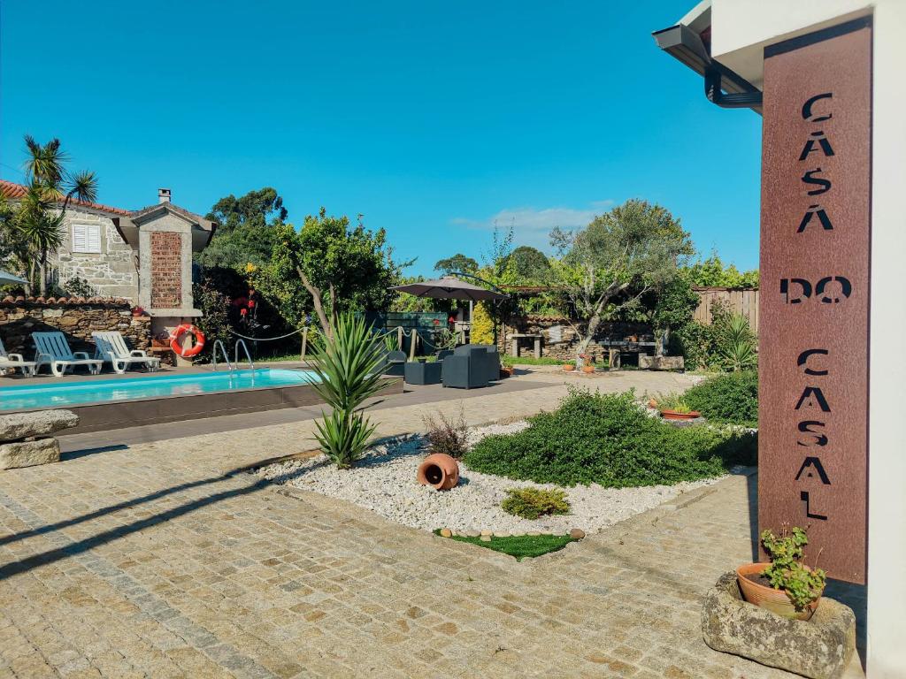 a sign for a resort with a swimming pool at Casa do Casal - Country House with Swimming Pool in Viana do Castelo