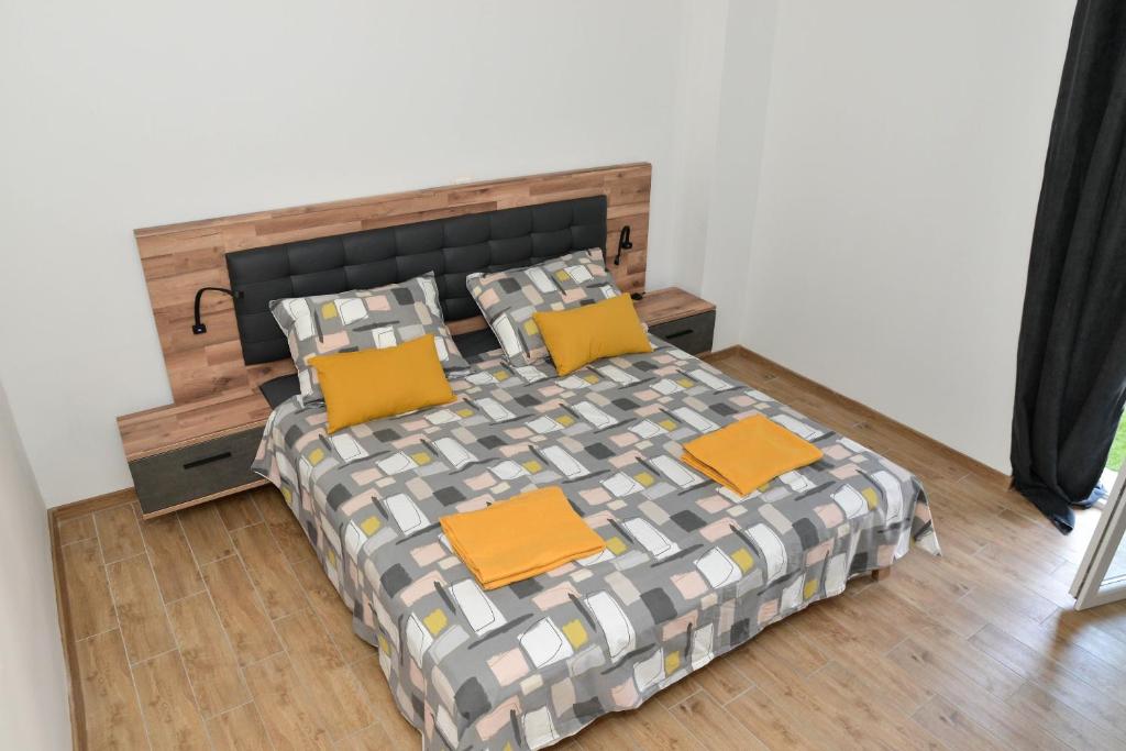 Posteľ alebo postele v izbe v ubytovaní Apartman Nina 3