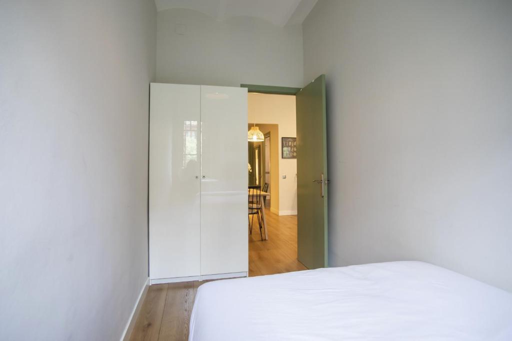 A bed or beds in a room at 31ENT1027 - Mediterranean decorated apartment
