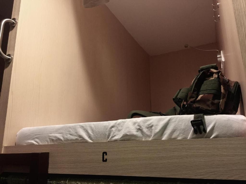 Postel nebo postele na pokoji v ubytování H2 Segama Backpacker