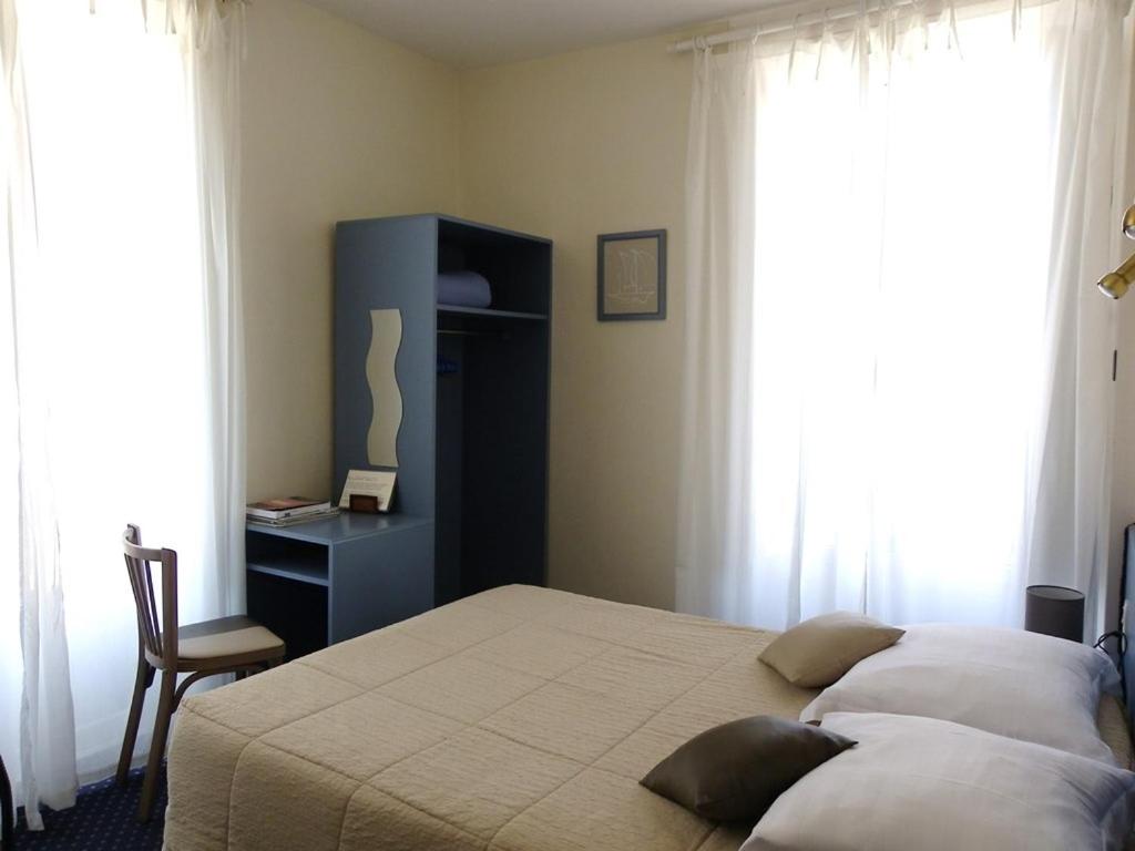 Cama ou camas em um quarto em HOTEL KAN AVEL