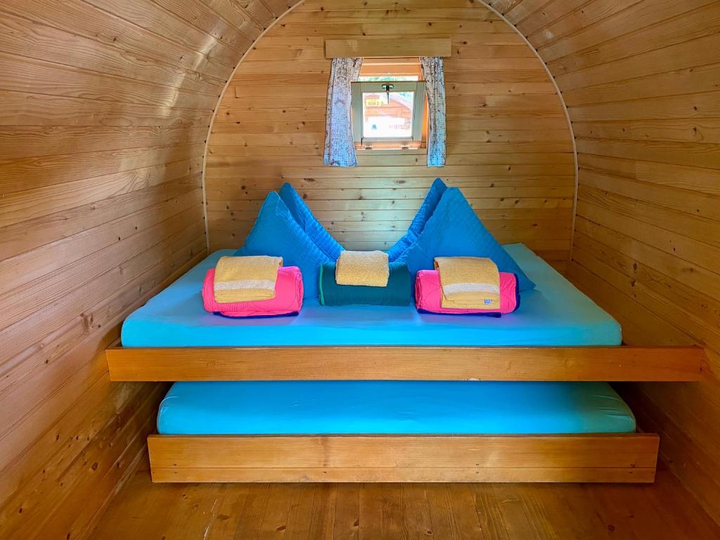 Postel nebo postele na pokoji v ubytování Camping Lazy Rancho - Eiger - Mönch - Jungfrau - Interlaken