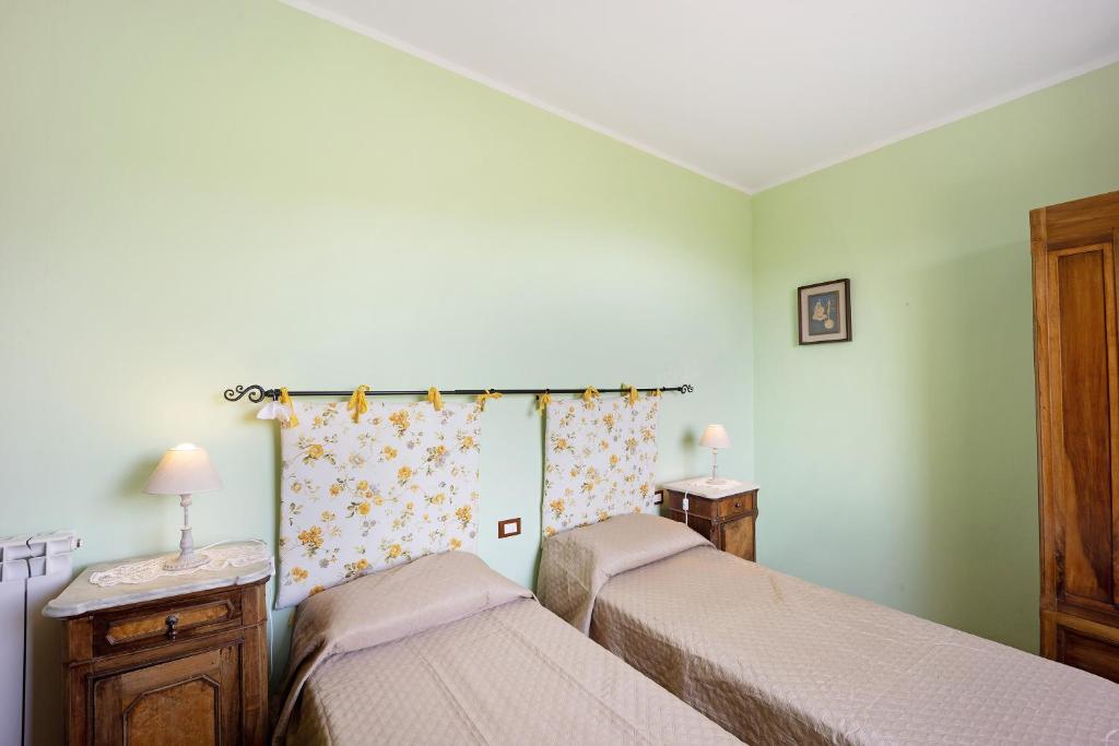 Posteľ alebo postele v izbe v ubytovaní Casale Filiberto Terrazza