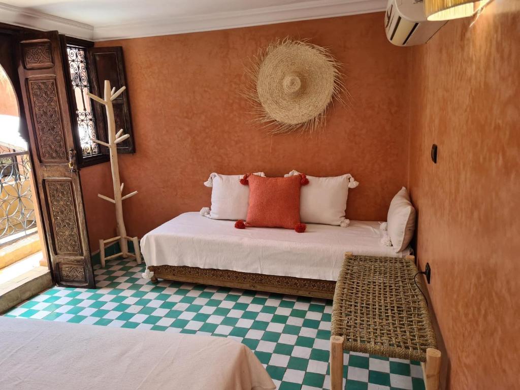 Ein Bett oder Betten in einem Zimmer der Unterkunft Riad Casa Sophia