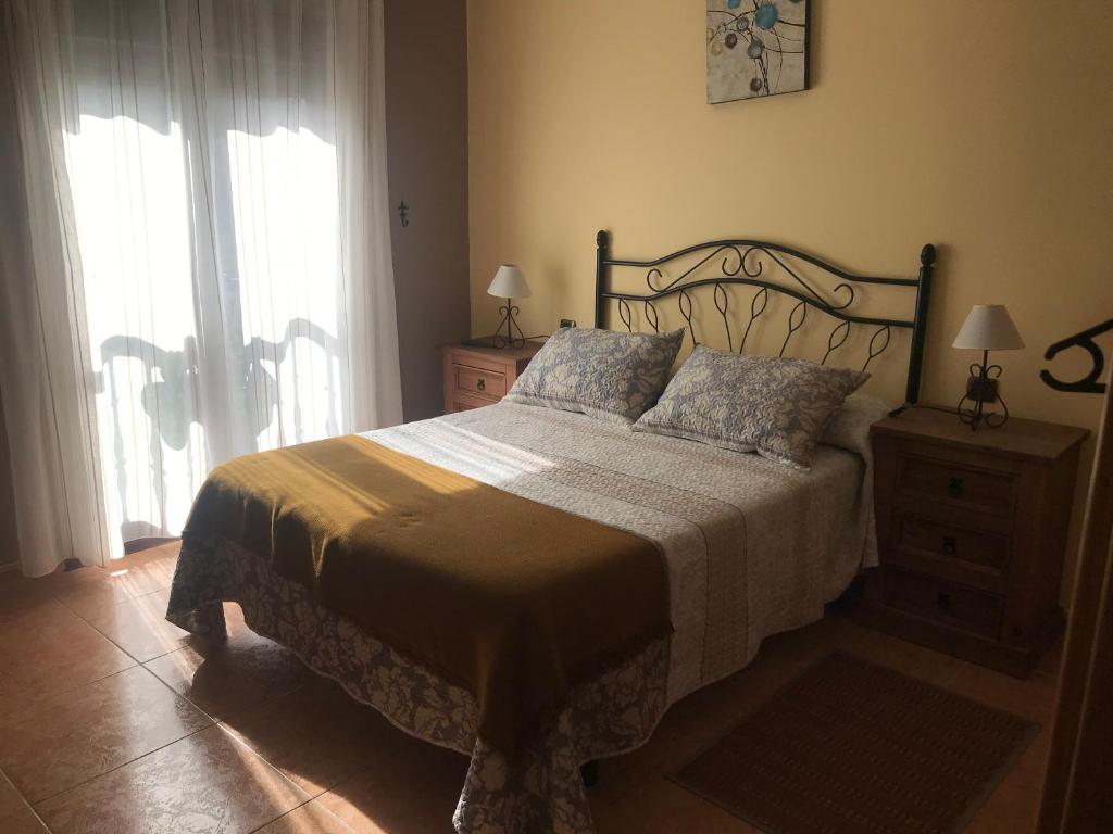 Posteľ alebo postele v izbe v ubytovaní Casa Louro