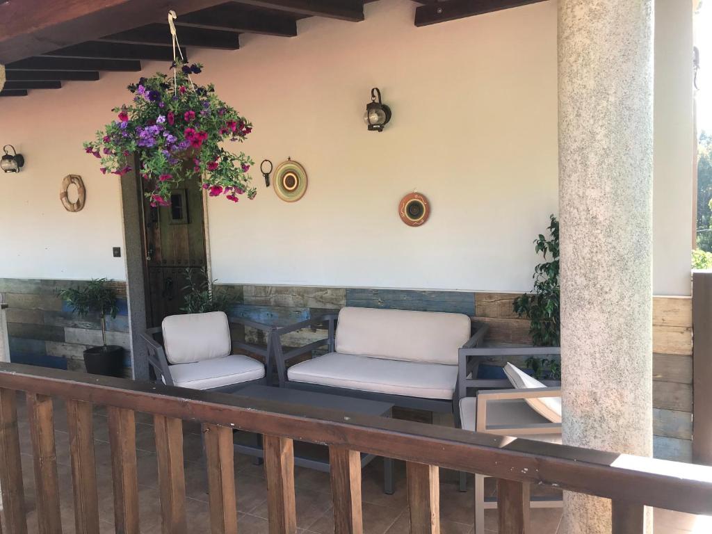 Posedenie v ubytovaní Casa Louro