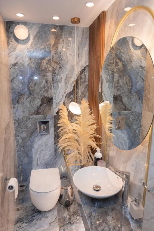 Kúpeľňa v ubytovaní Adell Miramare Golden Loft