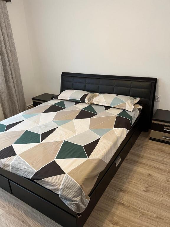 Postel nebo postele na pokoji v ubytování CASA ANDREI