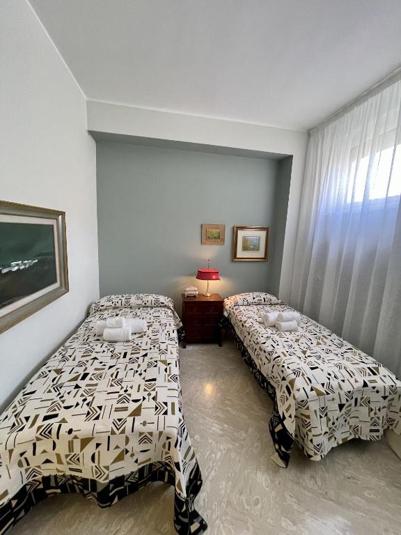 Posteľ alebo postele v izbe v ubytovaní 4 Balconi House-Elegante dimora nel centro storico