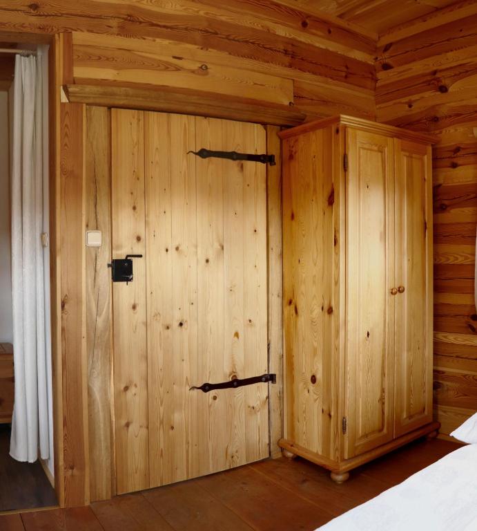 Postel nebo postele na pokoji v ubytování Letní byt ve skanzenu