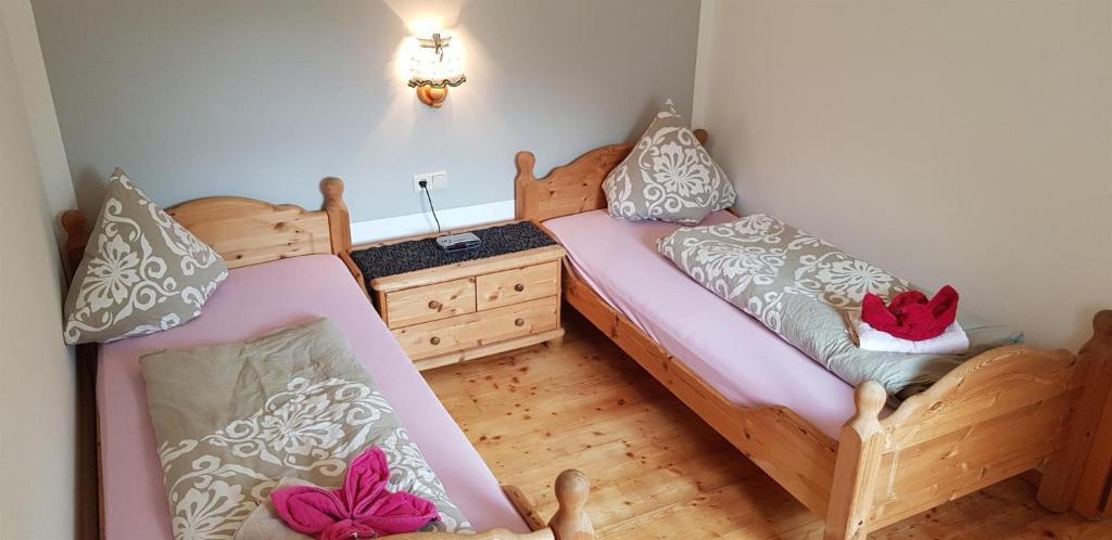 Postel nebo postele na pokoji v ubytování Ferienhaus Alfenz