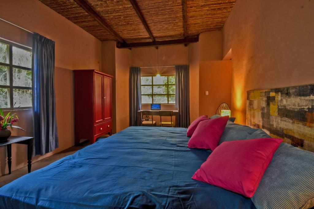 Postelja oz. postelje v sobi nastanitve Casa Capirona 1 - Laguna Azul