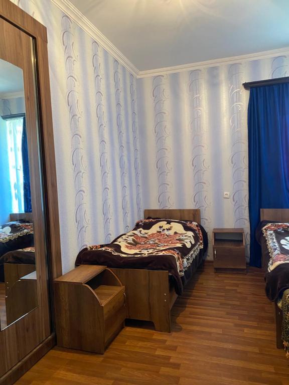 Postel nebo postele na pokoji v ubytování Vodo's Guesthouse