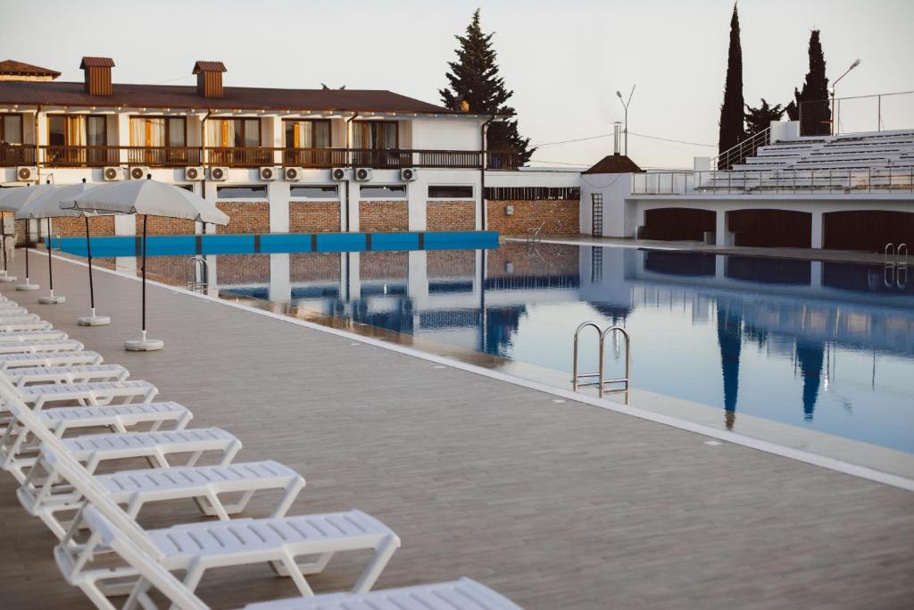 Bazén v ubytování DEM Hotel nebo v jeho okolí
