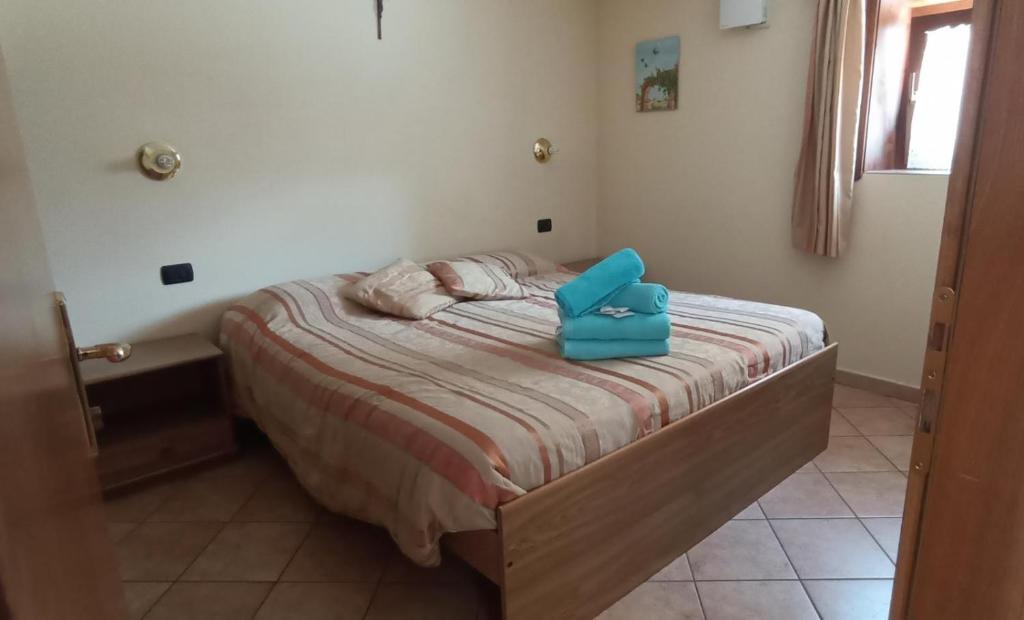 Postel nebo postele na pokoji v ubytování Garni Delia