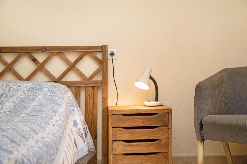 Łóżko lub łóżka w pokoju w obiekcie Apartamento Colibri