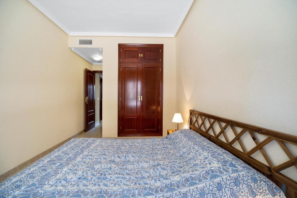 Łóżko lub łóżka w pokoju w obiekcie Apartamento Colibri