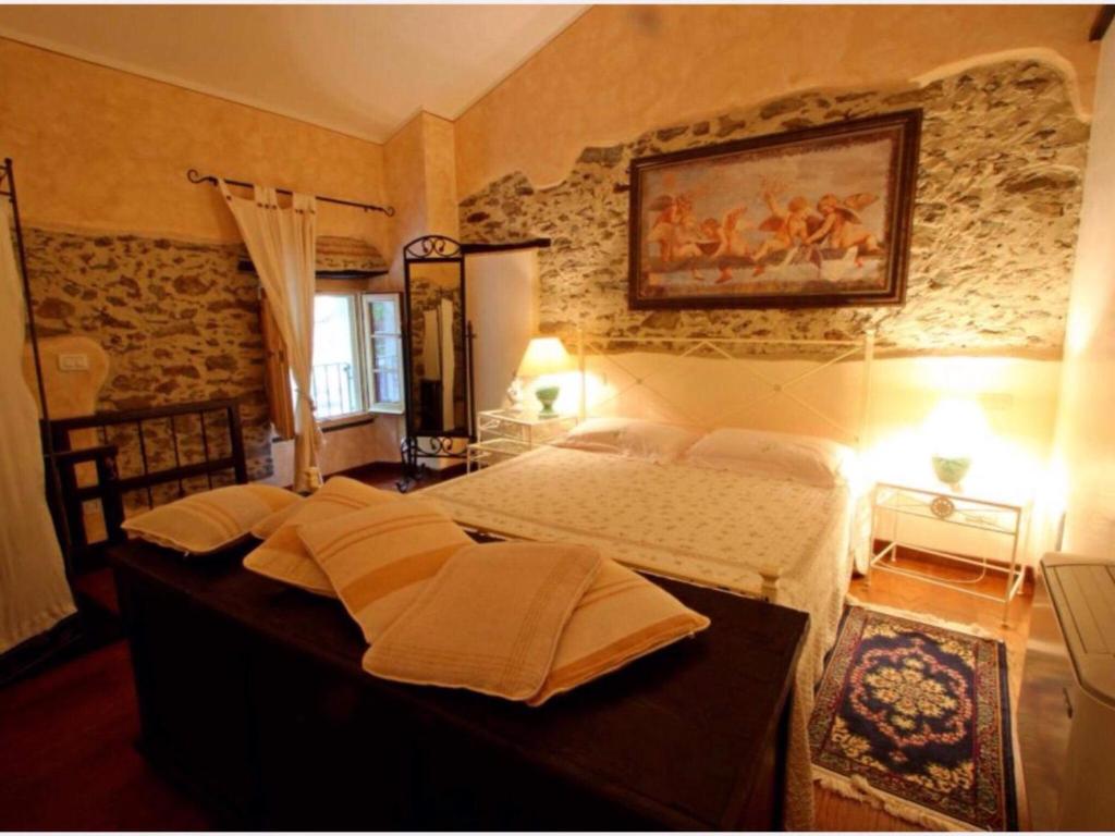 Postel nebo postele na pokoji v ubytování IL PICCOLO PARADISO