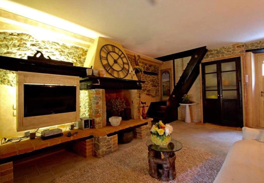 TV a/nebo společenská místnost v ubytování IL PICCOLO PARADISO