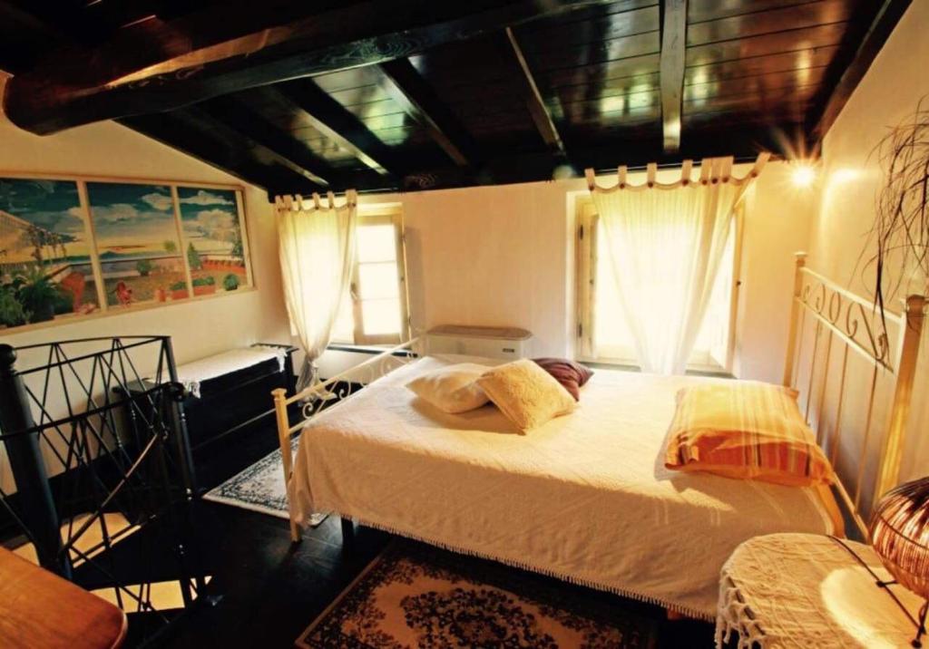 Postel nebo postele na pokoji v ubytování IL PICCOLO PARADISO