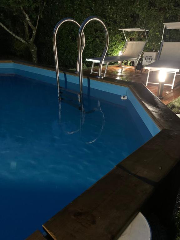 Bazén v ubytování IL PICCOLO PARADISO nebo v jeho okolí