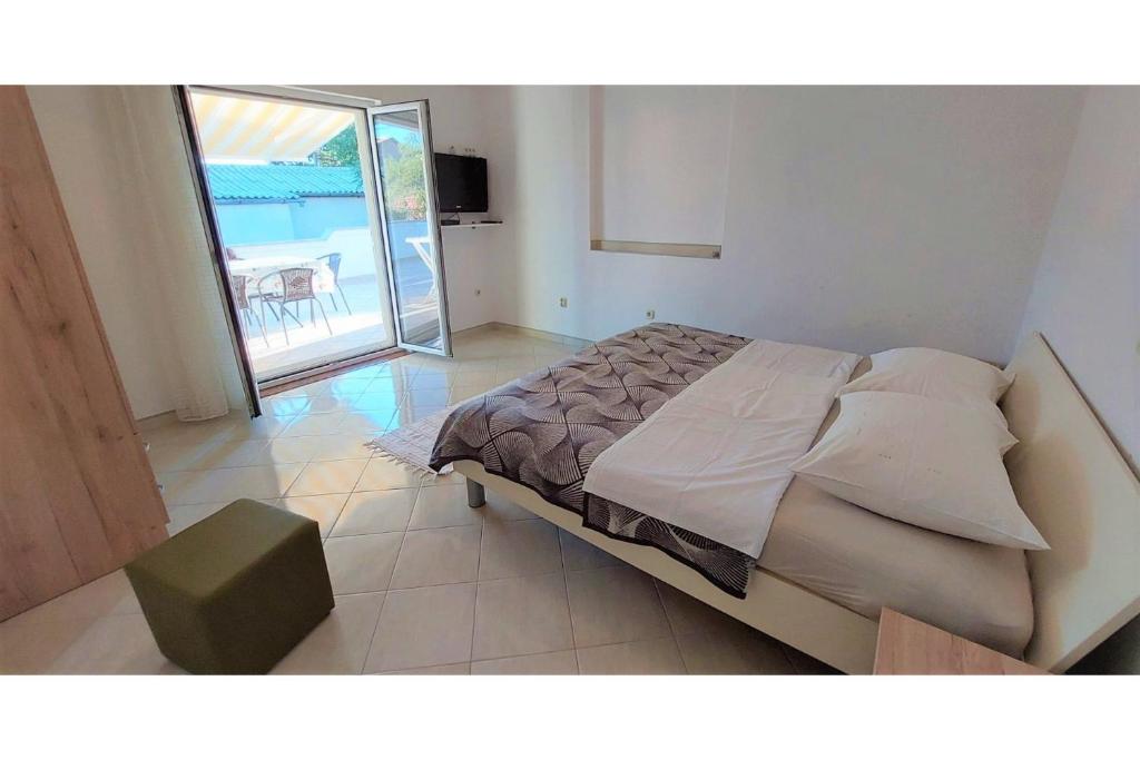 Postel nebo postele na pokoji v ubytování Apartments & Room Masa