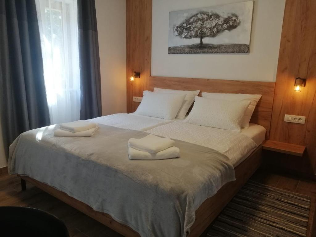Posteľ alebo postele v izbe v ubytovaní Plitvice Story