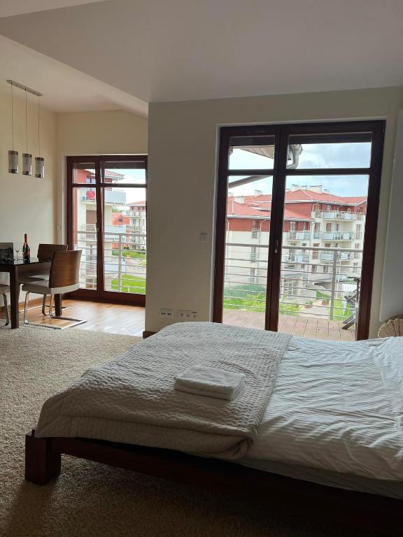 Posteľ alebo postele v izbe v ubytovaní Neptun Park Apartament - 100 m od plaży