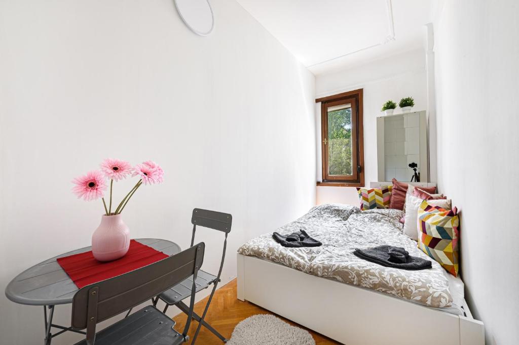 Postel nebo postele na pokoji v ubytování Stylish Homes Downtown Buda