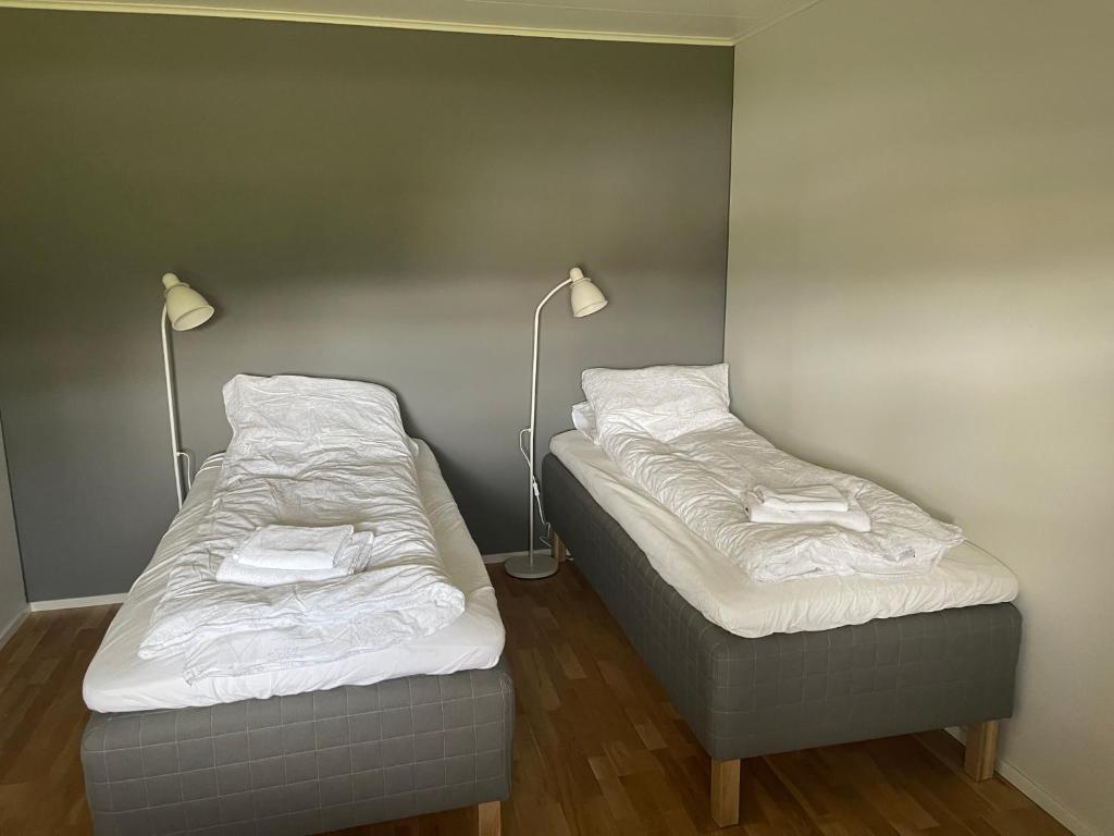 Postel nebo postele na pokoji v ubytování På Taket Overnatting