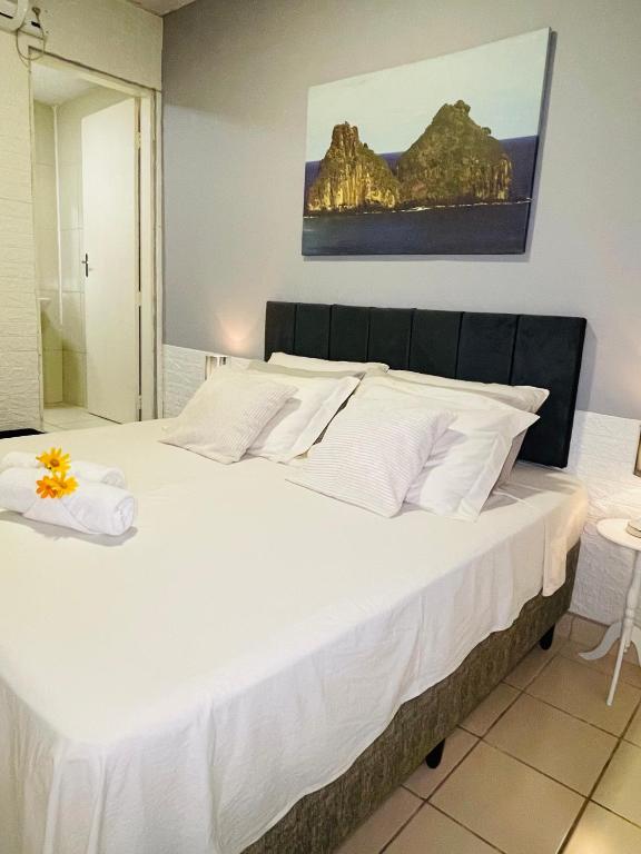 Postel nebo postele na pokoji v ubytování Hostel Ilha do Amor