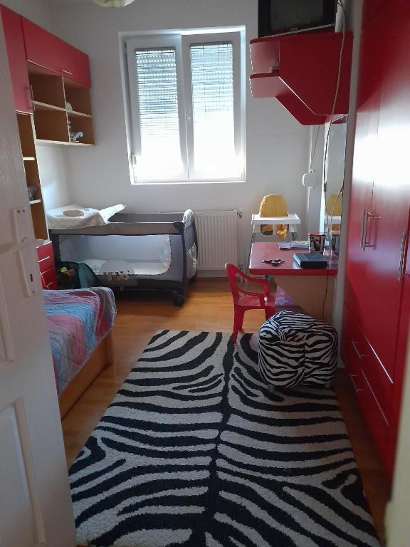 Postel nebo postele na pokoji v ubytování Family Apartman