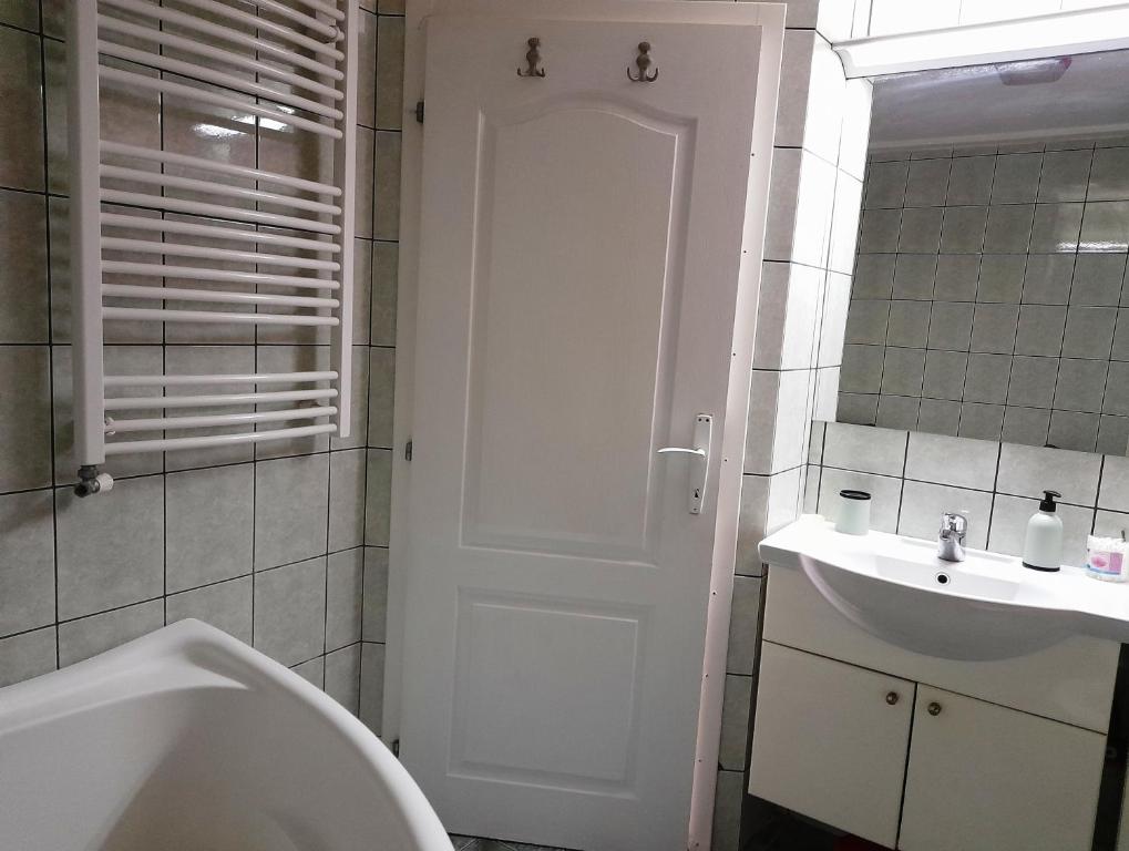 Koupelna v ubytování Family Apartman