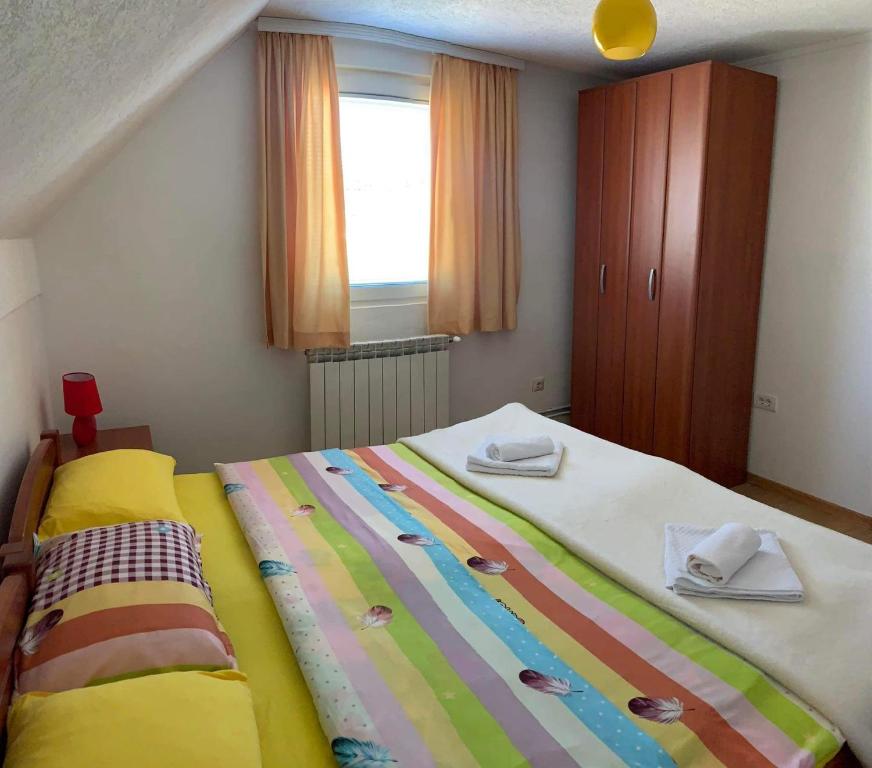 Postel nebo postele na pokoji v ubytování Apartment & Rooms Sweet Dreams