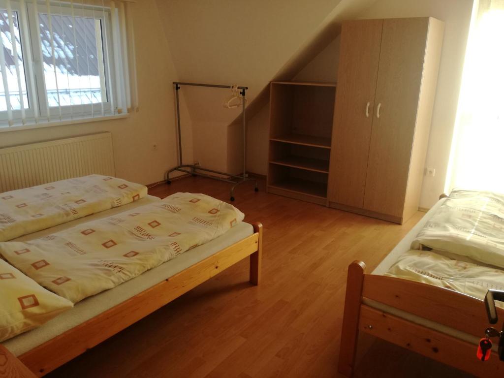 Postel nebo postele na pokoji v ubytování Apartment Majerčák