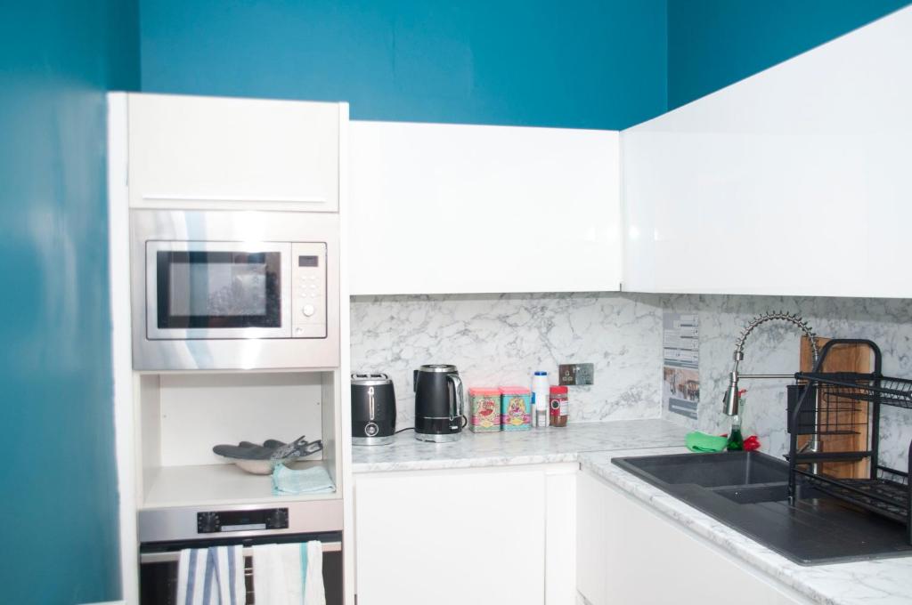Kuchyň nebo kuchyňský kout v ubytování Family Apartment - Skye - Private Members Club