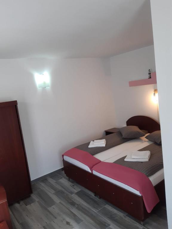 Letto o letti in una camera di Casa David