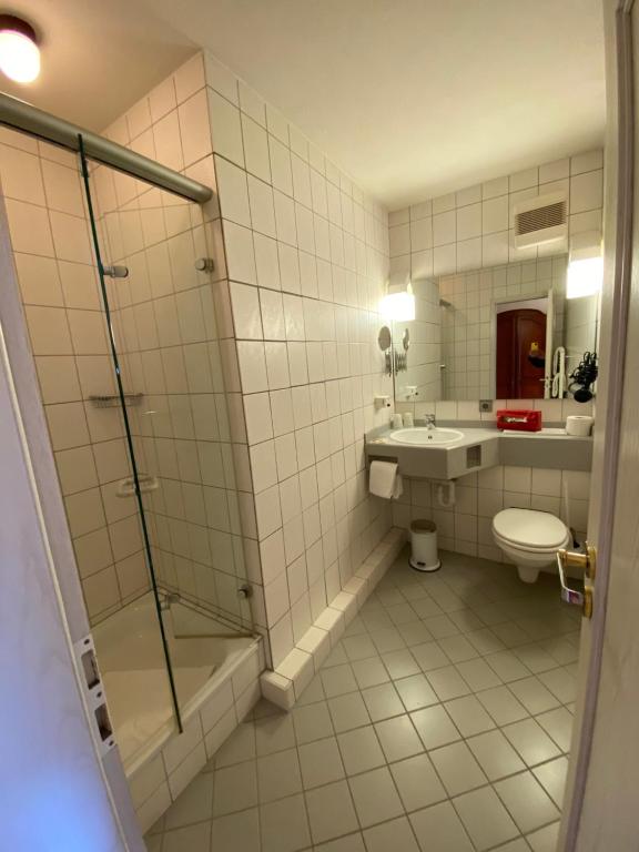 Koupelna v ubytování Hotel Garni Wiestor
