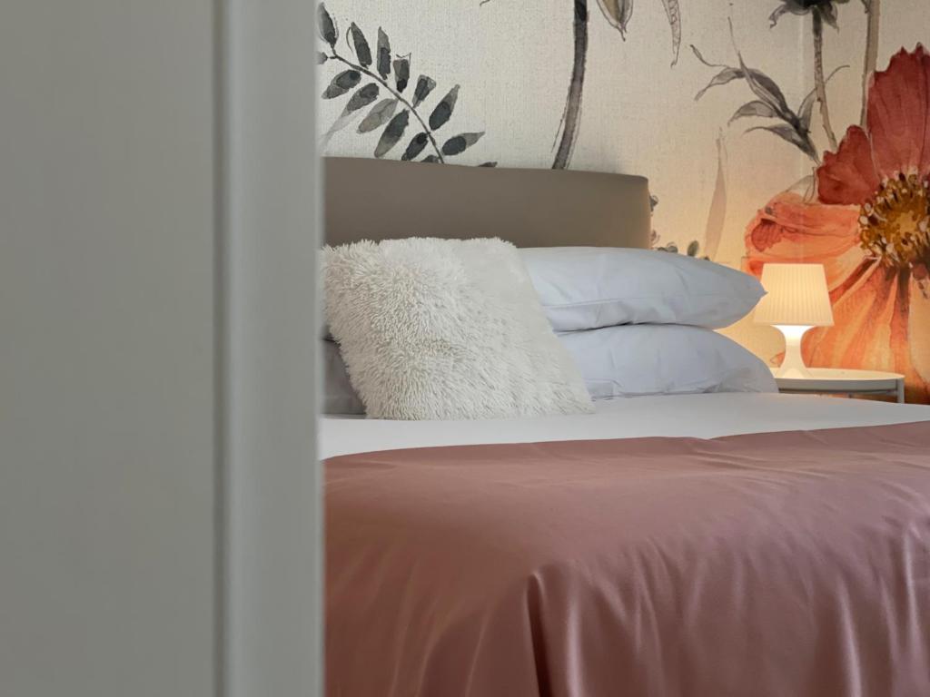 Ліжко або ліжка в номері Appartamenti Natura e Terra Marmore