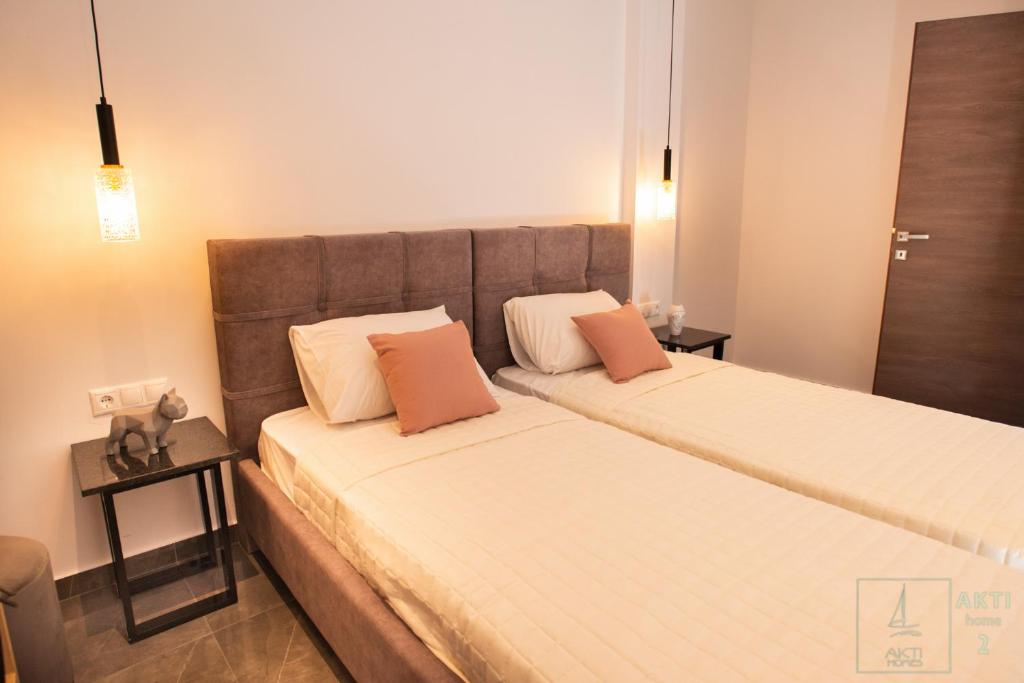 Postel nebo postele na pokoji v ubytování AKTI Homes Matala