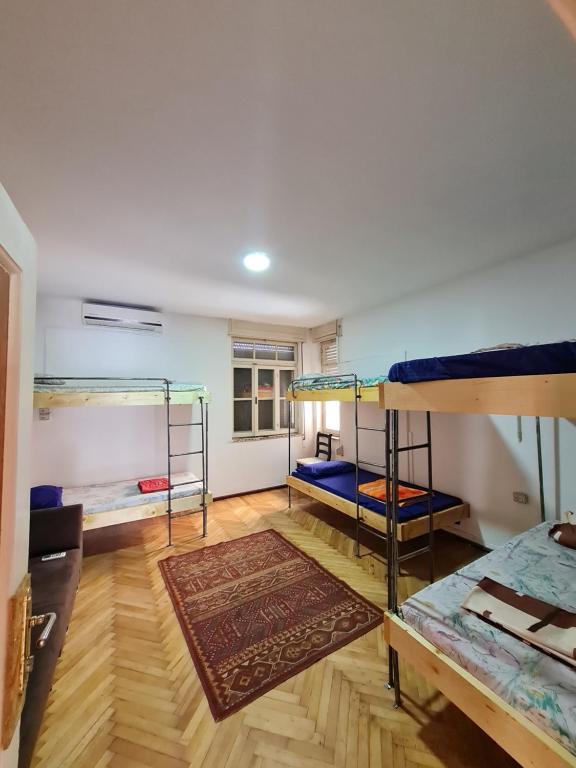 Letto o letti in una camera di Milingona City Center Hostel