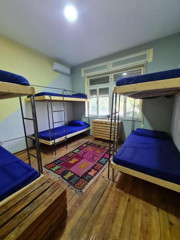 Letto o letti in una camera di Milingona City Center Hostel
