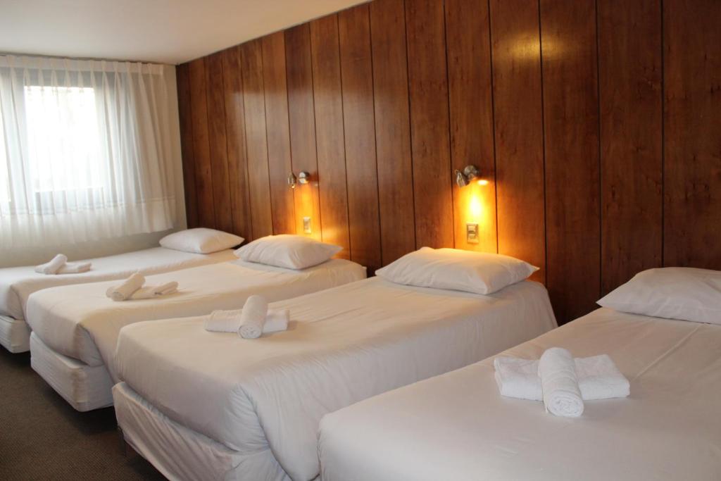 Postel nebo postele na pokoji v ubytování Hotel Germania