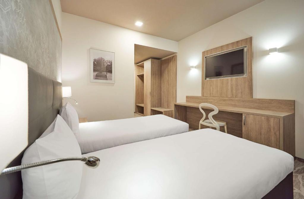 Postel nebo postele na pokoji v ubytování Radisson Hotel City Centre Odesa