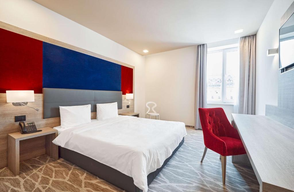 Postel nebo postele na pokoji v ubytování Radisson Hotel City Centre Odesa