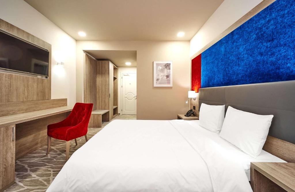 Postel nebo postele na pokoji v ubytování Radisson Hotel City Centre Odesa