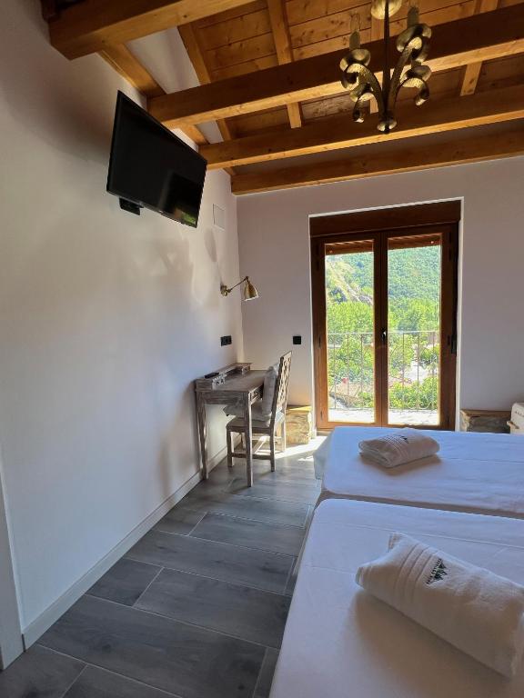 Postel nebo postele na pokoji v ubytování El hotel de Verdiago