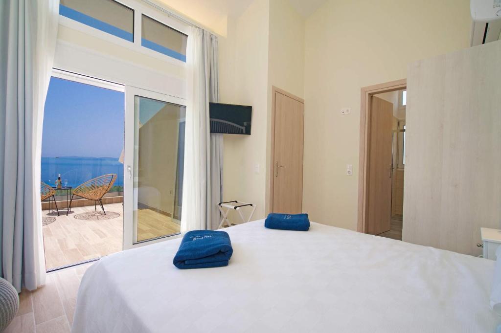 Posteľ alebo postele v izbe v ubytovaní Villa Michou Thalassa by Villa Plus