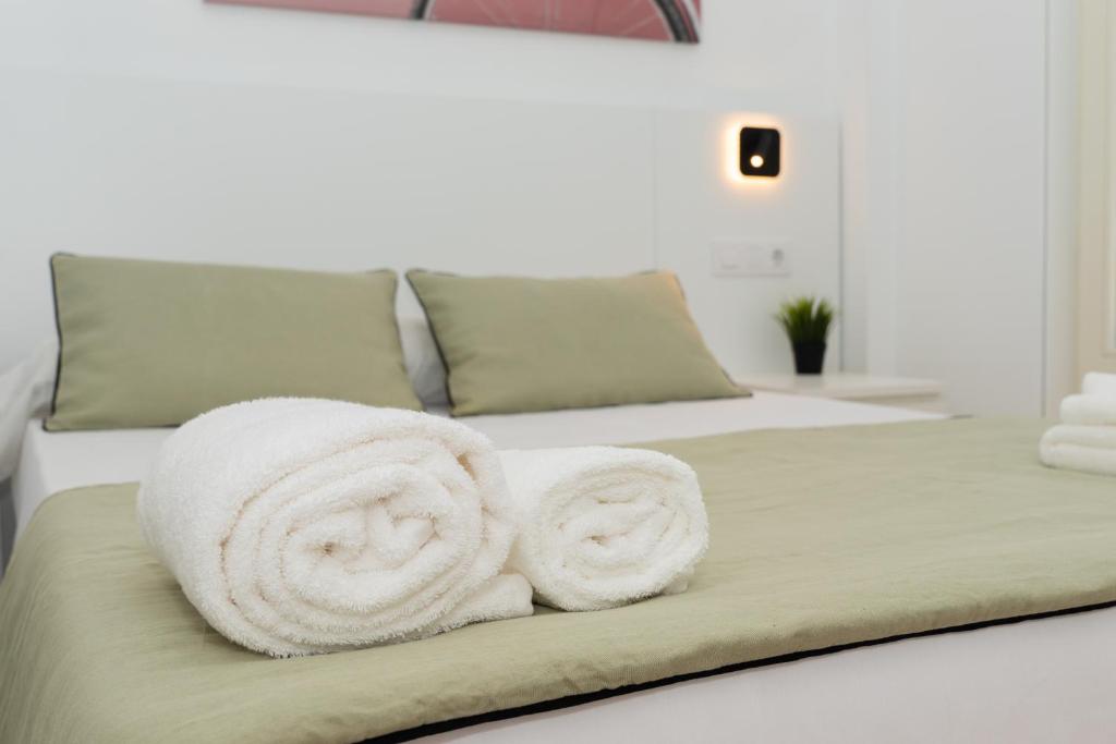 Ένα ή περισσότερα κρεβάτια σε δωμάτιο στο Hostel Charino